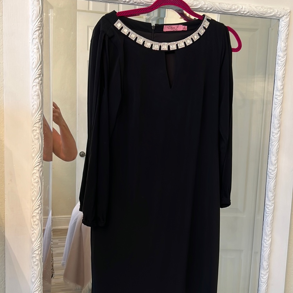 Black stretchy long sleeved dress with angel hole sleeve